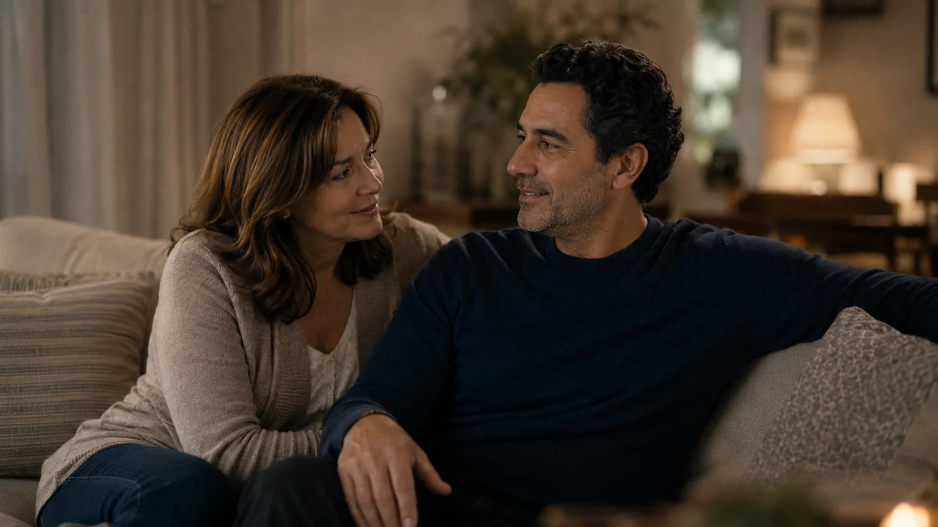 A woman and her husband in easy conversation on a quiet evening