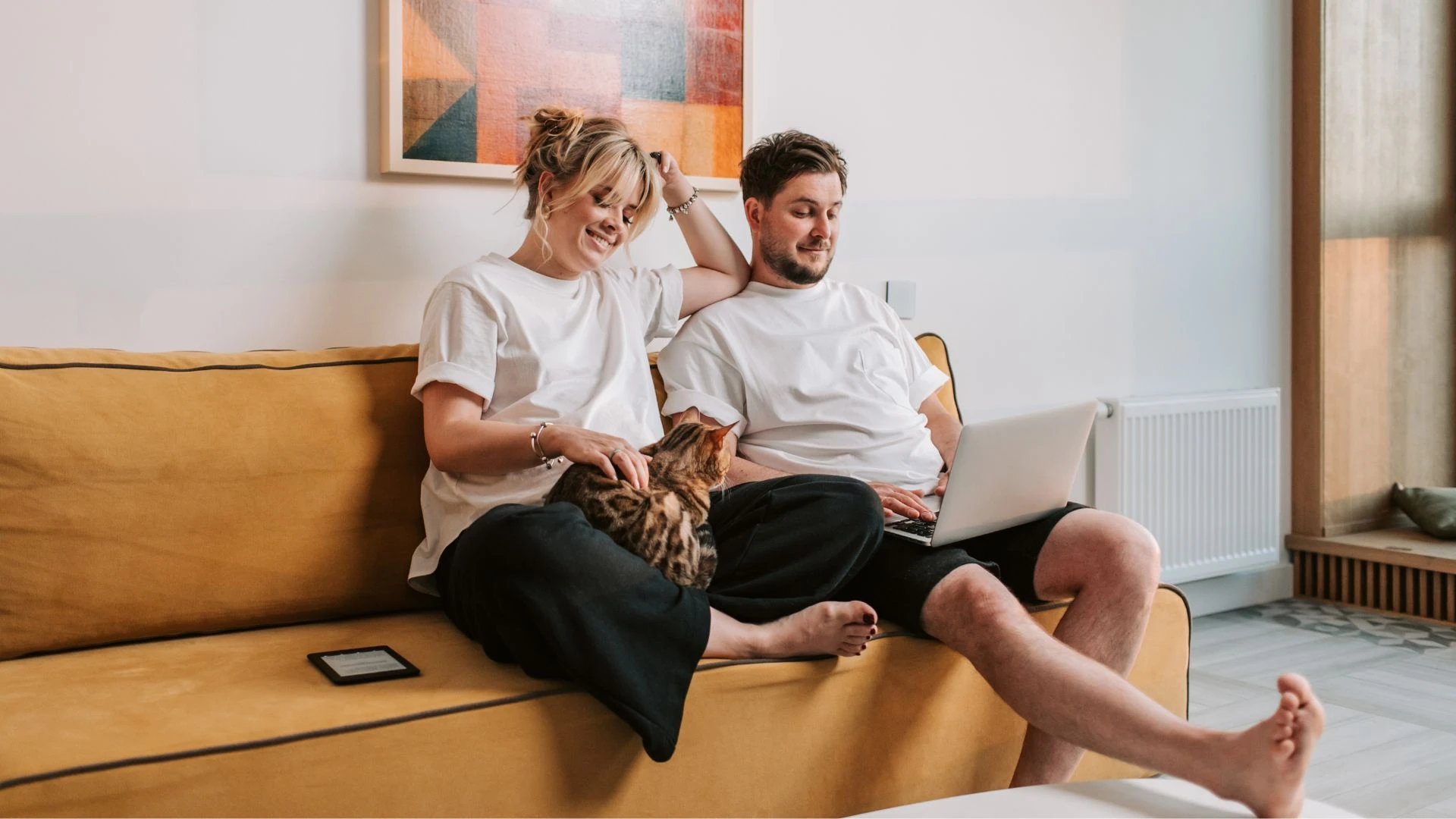 Couple at home on a video call for online counselling